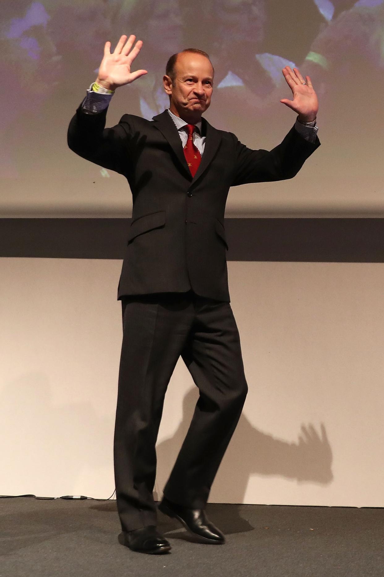 Newly elected UKIP leader Henry Bolton waves to the crowd after speaking at their autumn conference (Photo by Matt Cardy/Getty Images)