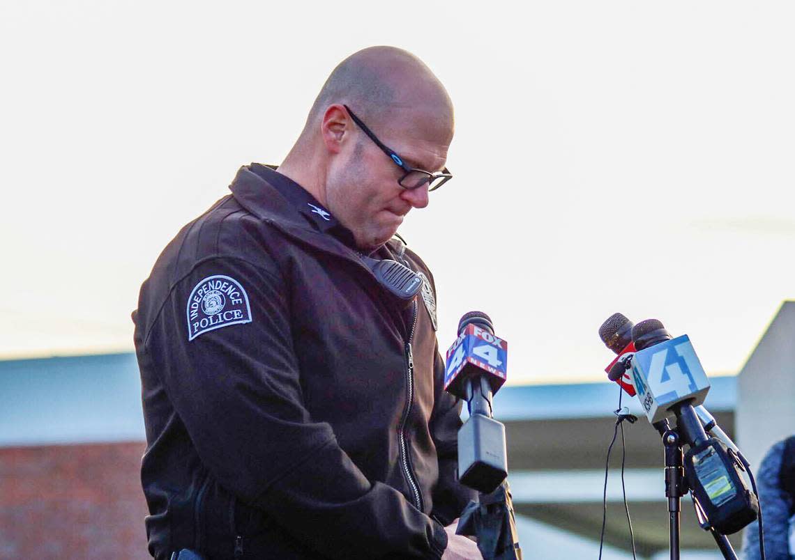 Independence Chief of Police Adam Dustman chokes up Thursday while delivering the news that Independence police officer Cody Allen was one of two people killed in a shooting in the eastern part of the city. The other person killed was civil process server Drexel Mack. Kendrick Calfee/kcalfee@kcstar.com