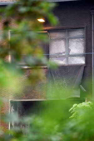 A view shows a partially destroyed part of the Belgium's National Institute of Criminology after arsonists set fire to it in Brussels, Belgium August 29, 2016. REUTERS/Eric Vidal