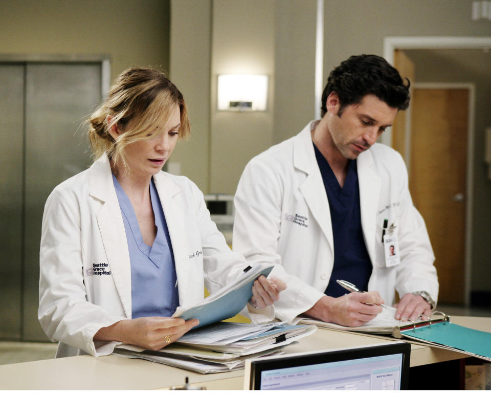 Meredith and Derek talking and working in a hospital in "Grey's Anatomy"