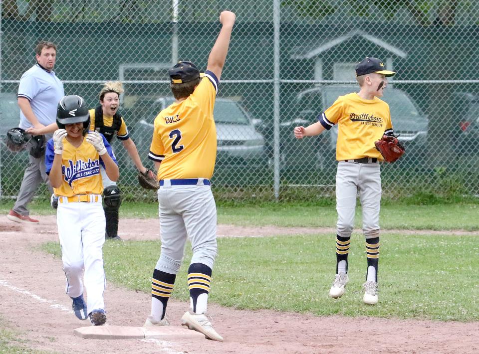 Brattleboro catcher Kason Gundy, first baseman Kaden Cole and pitcher Logan Waite celebrate after making the final out of their 8-1 win over Williston in the 10-12 Little League state championship game on Saturday morning at Cioffi Park in St. Albans. 