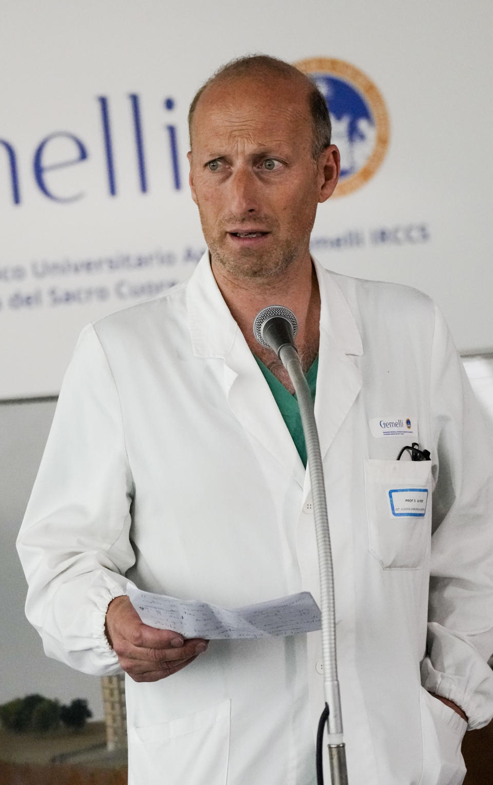 Surgeon Sergio Alfieri speaks to reporters Saturday, June 10, 2023, about Pope Francis' health conditions after operating on him at Rome's Agostino Gemelli University Polyclinic, on Wednesday. Pope Francis, who underwent surgery Wednesday to repair a hernia in his abdominal wall, is following a careful convalescence which aims at reducing the effort of the abdominal wall, to allow the implanted prosthetic mesh and the repair of the muscular fascia to heal optimally. (AP Photo/Alessandra Tarantino)