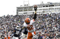 Illinois tight end Luke Ford (82) reaches for a pass that fell incomplete as Penn State safety Ji'Ayir Brown (16) looks on during overtime of an NCAA college football game in State College, Pa., Saturday, Oct. 23, 2021. Illinois defeated Penn State 20-18 in the ninth overtime. (AP Photo/Barry Reeger)