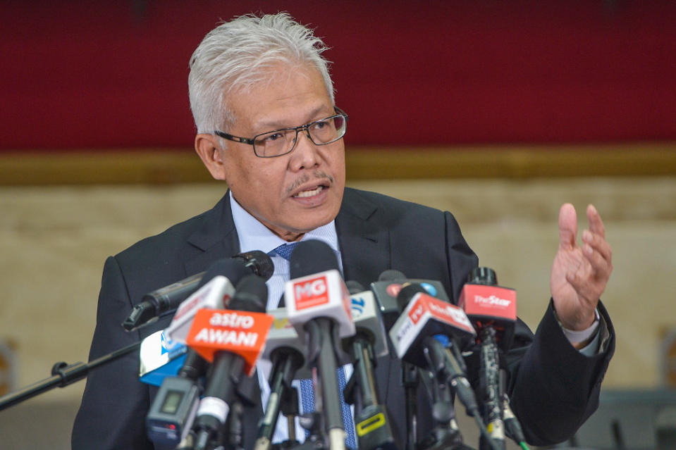 Home Minister Datuk Seri Hamzah Zainudin speaks during a press conference at the Ministry of Human Resources, Putrajaya December 3, 2020. — Picture by Miera Zulyana