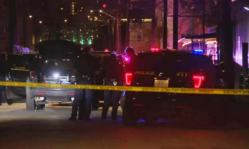 In this image made from video provided by KSAT, San Antonio police officers work the scene of a deadly shooting at the Ventura, a music venue in San Antonio, Texas, Sunday, Jan. 19, 2020. Texas authorities says at least a few people were killed and several others were injured following the shooting during the concert inside the club. (KSAT via AP)