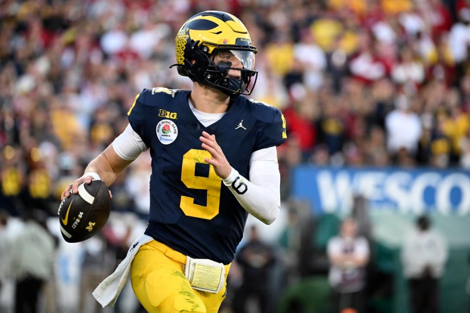 Michigan quarterback J.J. McCarthy (9) rolls out during the second half of the Rose Bowl (AP)