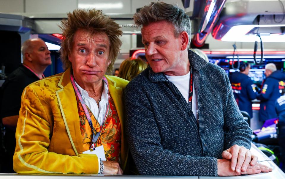 Rod Stewart and Gordon Ramsay talk in the Red Bull Racing garage during qualifying ahead of the F1 Grand Prix of Las Vegas at Las Vegas Strip Circuit on November 17, 2023 in Las Vegas,