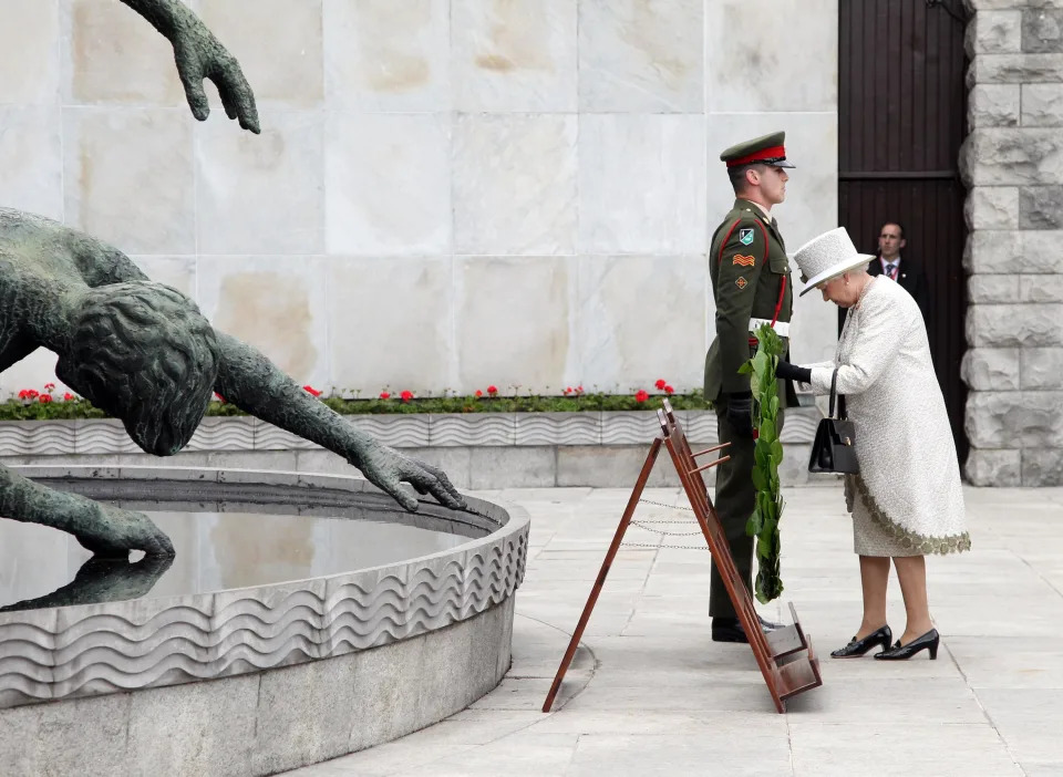 DUBLIN, IRELAND - MAY 17: Queen Elizabeth II lays a wreath at the Garden of Remembrance on May 17, 2011 in Dublin, Ireland. The Duke and Queen's visit is the first by a monarch since 1911. An unprecedented security operation is taking place with much of the centre of Dublin turning into a car free zone. Republican dissident groups have made it clear they are intent on disrupting proceedings.  (Photo by Irish Government - Pool/Getty Images)