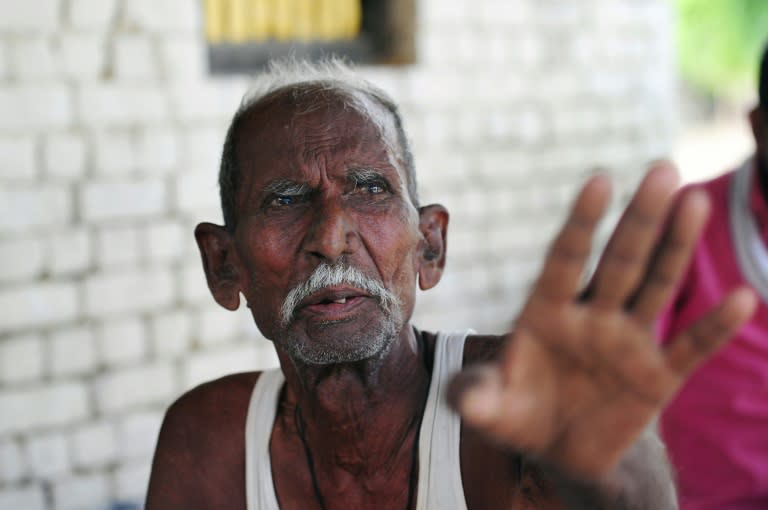 Indian farmer Ramjanam Mauriya, who is struggling to prove to authorities that he is still alive after being declared dead by his younger brother, at home in Uttar Pradesh