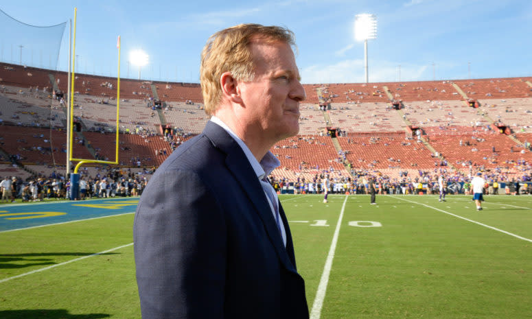 Roger Goodell on the field before an NFL game.