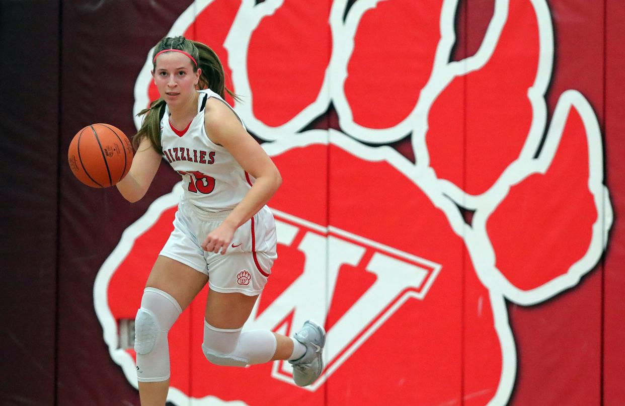 Wadsworth's Brooke Baughman takes the ball up the court against Stow on Dec. 13, 2023, in Wadsworth.
