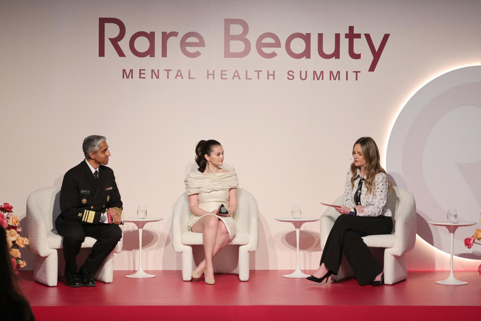 NEW YORK, NEW YORK - MAY 01: (L-R) Surgeon General Vivek H. Murthy, Selena Gomez, and Elyse Cohen speak onstage during Rare Beauty’s 3rd Annual Mental Health Summit at  on May 01, 2024 in New York City. (Photo by Cindy Ord/Getty Images for Rare Beauty)