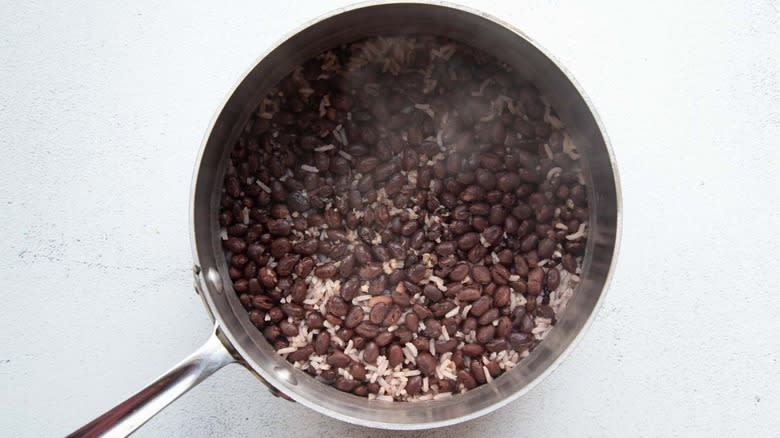 cooked rice and beans in pan