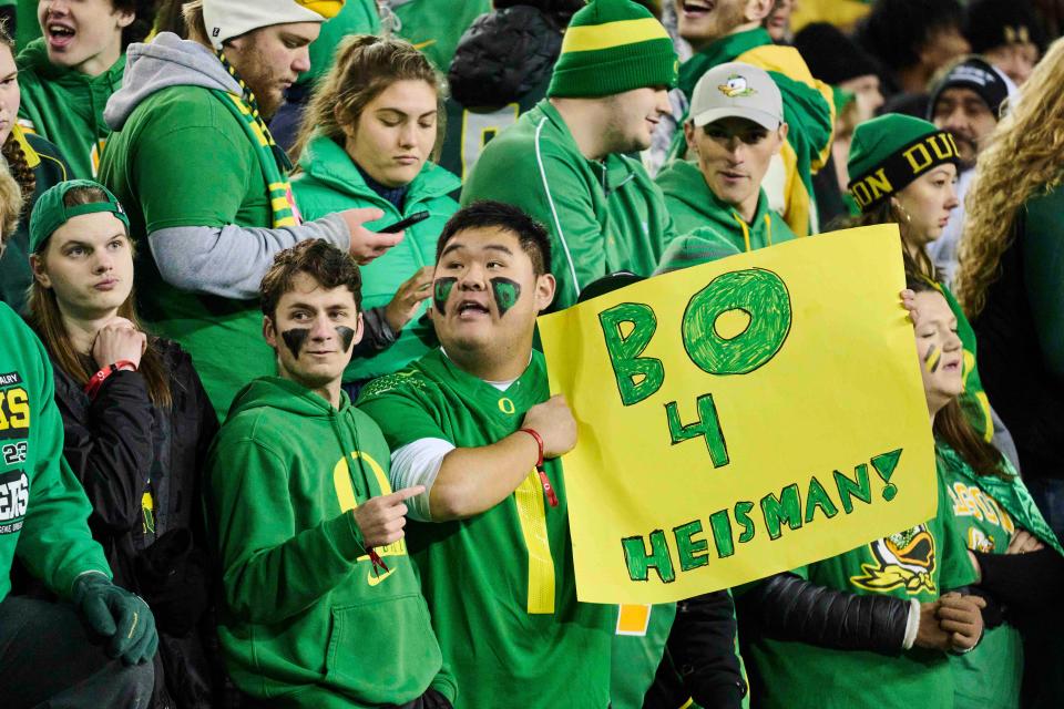 Oregon Ducks fans hold a sign in support of Bo Nix during the first half against the Oregon State Beavers at Autzen Stadium Nov. 24, 2023, in Eugene.