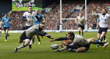 Britain Rugby Union - Scotland v Italy - Six Nations Championship - BT Murrayfield Stadium, Edinburgh, Scotland - 18/3/17 Scotland's Tim Visser (R) scores their third try Action Images via Reuters / Lee Smith Livepic