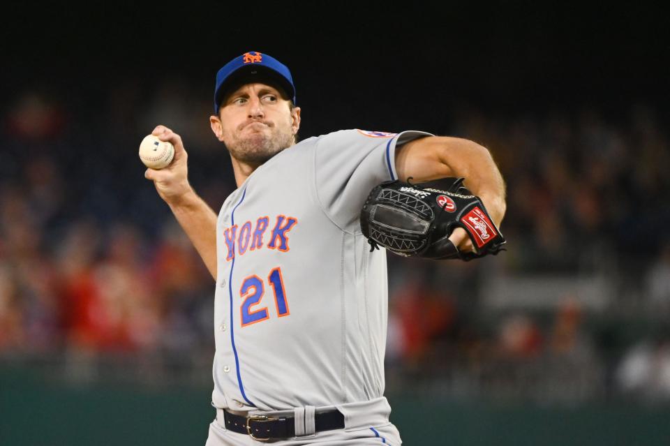 New York Mets starting pitcher Max Scherzer delivers a pitch in the second inning against the Washington Nationals at Nationals Park.