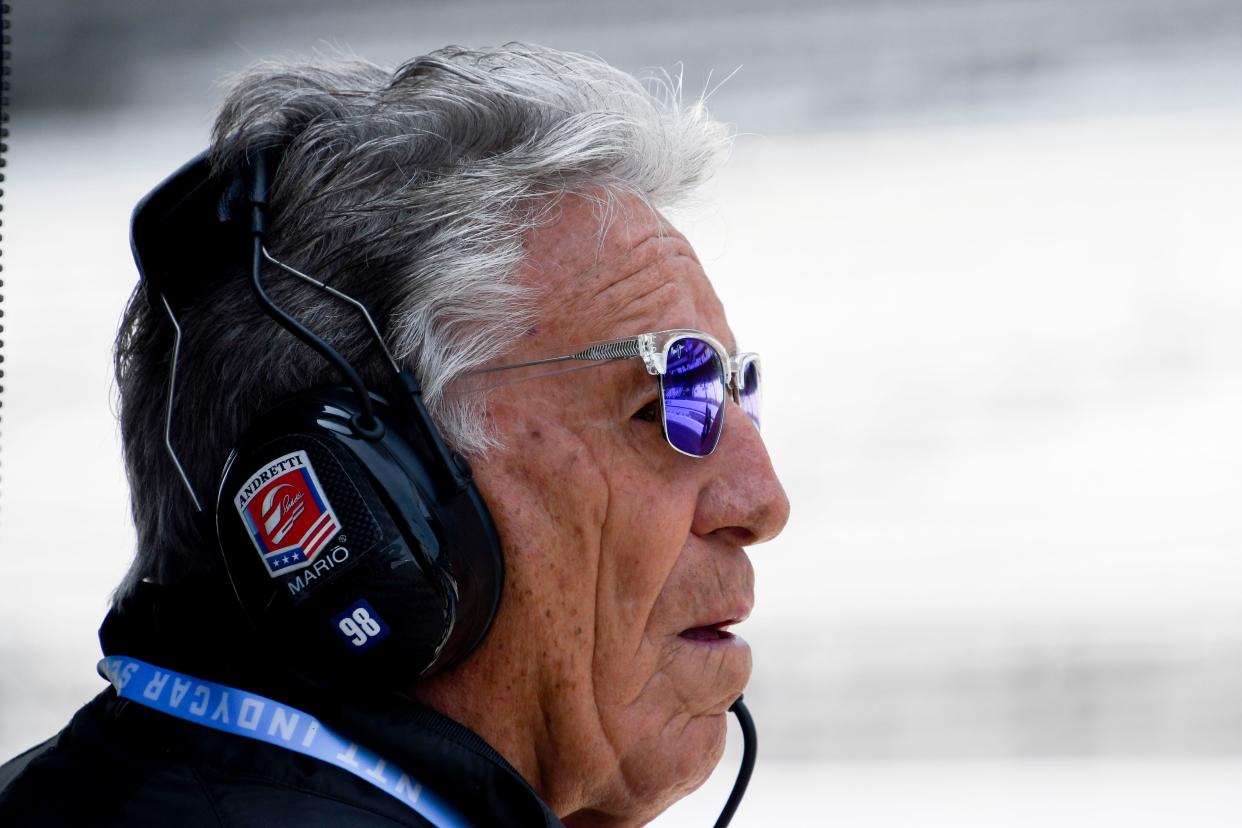 Mario Andretti watches the action on the track Wednesday, May 17, 2023, during the second day of practice for the Indianapolis 500 at Indianapolis Motor Speedway. 