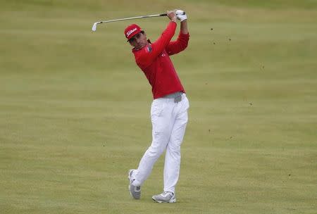 Rafael Cabrera-Bello of Spain plays his approach on the fourth hole during a practice round ahead of the British Open golf championship on the Old Course in St. Andrews, Scotland, July 15, 2015. REUTERS/Russell Cheyne