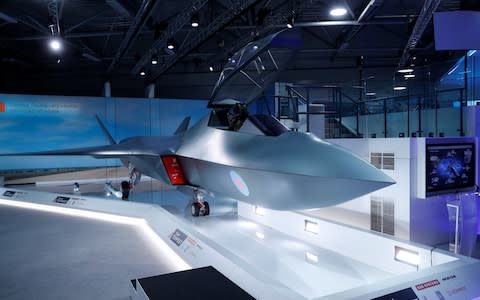 Britain's defence minister, Gavin Wiliamson, unveiled a model of a new jet fighter, called 'Tempest' at the Farnborough Airshow - Credit: PETER NICHOLLS/REUTERS