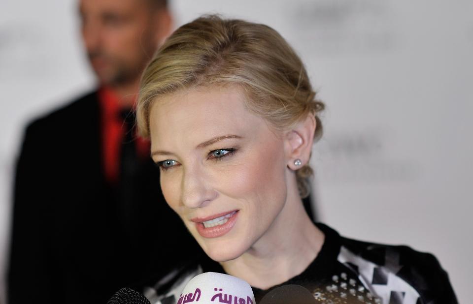 DUBAI, UNITED ARAB EMIRATES - DECEMBER 10: Actress Cate Blanchett speaks to the media as she attends the Dubai International Film Festival and IWC Schaffhausen Filmmaker Award Gala Dinner and Ceremony at the One and Only Mirage Hotel on December 10, 2012 in Dubai, United Arab Emirates. (Photo by Gareth Cattermole/Getty Images for DIFF)