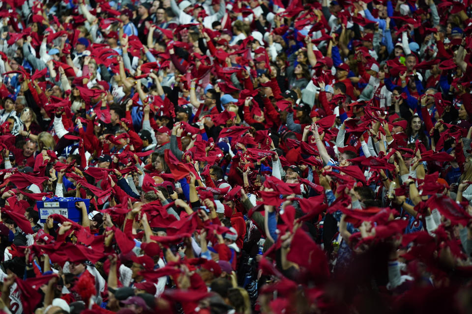 Fans cheer before Game 3 of baseball's World Series between the Houston Astros and the Philadelphia Phillies on Tuesday, Nov. 1, 2022, in Philadelphia. (AP Photo/Chris Szagola)