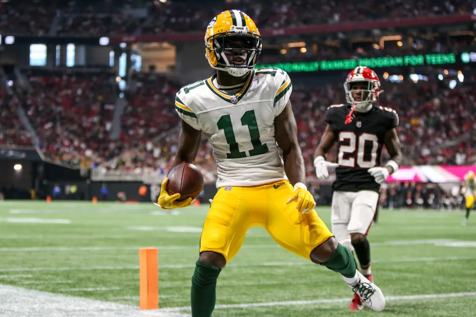 Sep 17, 2023; Atlanta, Georgia, USA; Green Bay Packers wide receiver <a class="link " href="https://sports.yahoo.com/nfl/players/40063" data-i13n="sec:content-canvas;subsec:anchor_text;elm:context_link" data-ylk="slk:Jayden Reed;sec:content-canvas;subsec:anchor_text;elm:context_link;itc:0"&gtJayden Reed</a> (11) scores a touchdown against the Atlanta Falcons in the second half at Mercedes-Benz Stadium. Mandatory Credit: Brett Davis-USA TODAY Sports