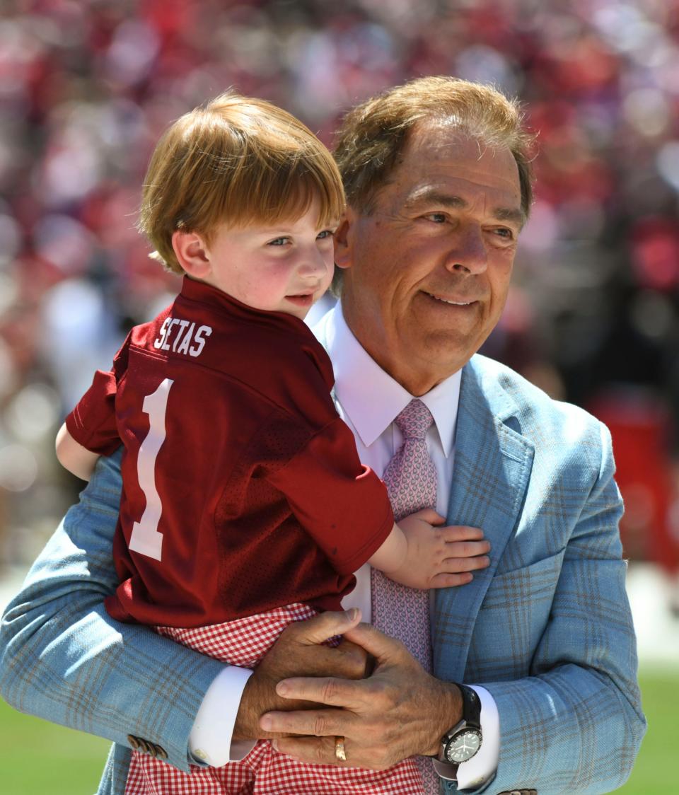 Apr 22, 2023; Tuscaloosa, AL, USA;  Alabama head coach Nick Saban holds his grandson before the A-Day game at Bryant-Denny Stadium. 