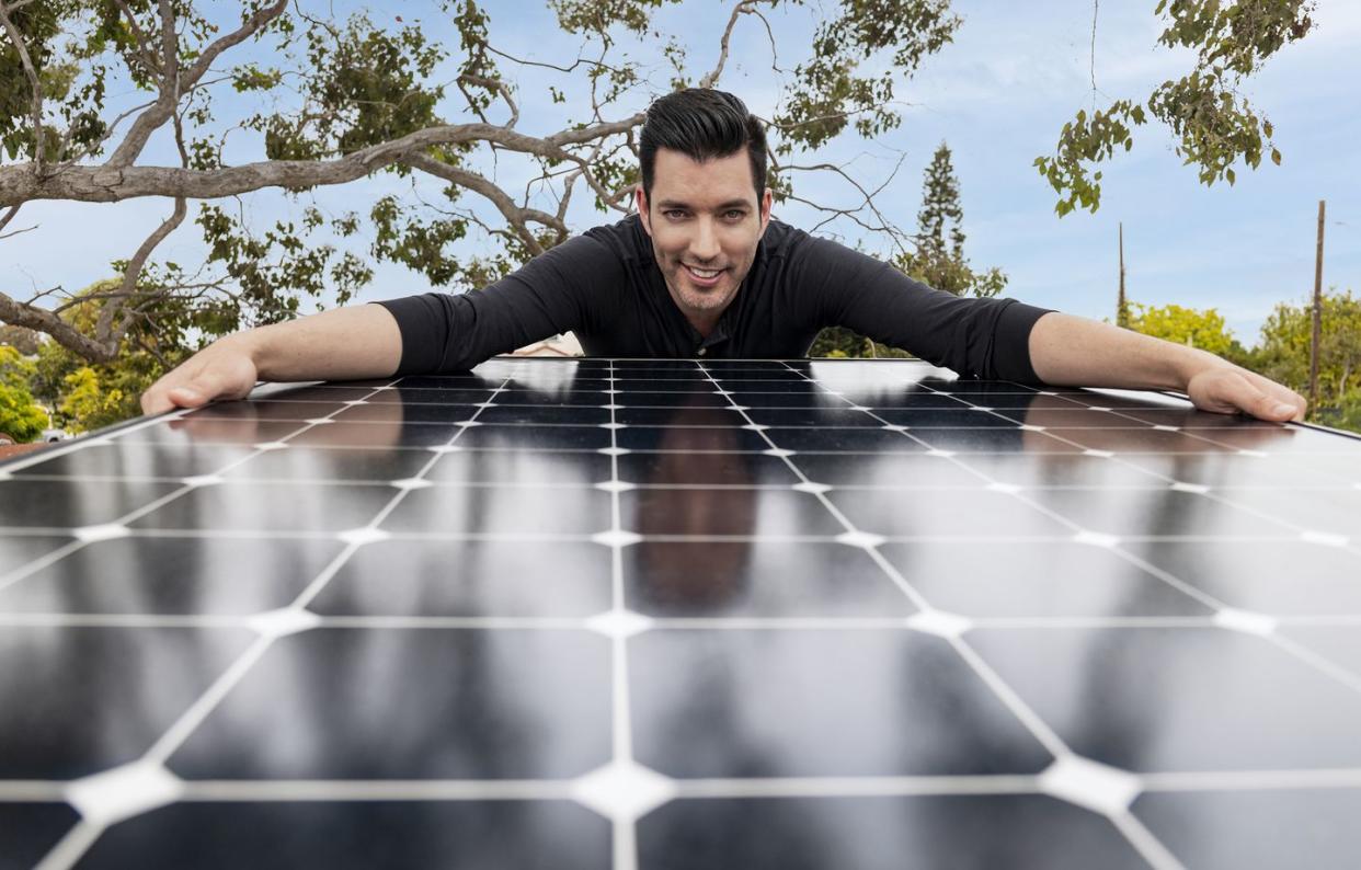 jonathan scott with a solar panel