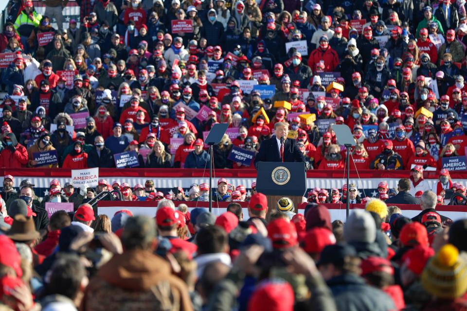 At least 1,000 President Trump supporters listen as he delivers remarks during a Make America Great Again rally on Oct. 30, 2020, at Green Bay Austin Straubel International Airport in Ashwaubenon.