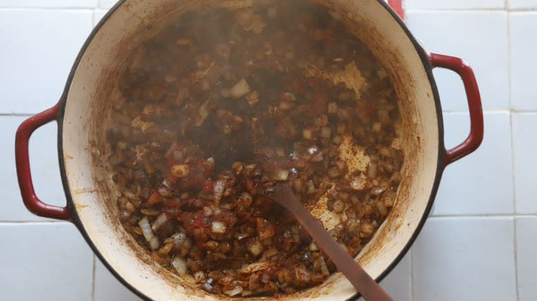 Tomato paste added to pot