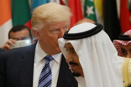 U.S. President Donald Trump and Saudi Arabia's King Salman bin Abdulaziz Al Saud (R) attend the Arab Islamic American Summit in Riyadh, Saudi Arabia May 21, 2017. REUTERS/Jonathan Ernst/Files
