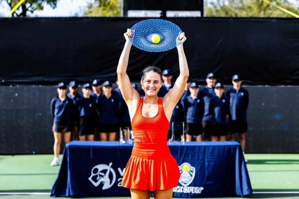 Marta Kostyuk holds up the trophy after winning the inaugural ATX Open at Westwood Country Club in March. She defeated Varvara Gracheva 6-3, 7-5 in the finals.