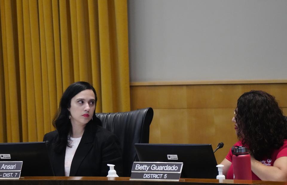 Vice Mayor Yassamin Ansari speaks to Councilmember Betty Guardado during a Phoenix City Council meeting on March 22, 2023, in Phoenix.