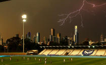 <p>A general view as lightning strikes near buildings in the city of Melbourne during the round eight W-League match between the Melbourne Victory and Western Sydney Wanderers at Lakeside Stadium on November 24, 2017 in Melbourne, Australia. (Photo by Scott Barbour/Getty Images) </p>