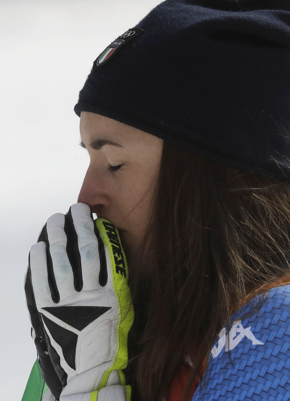 Gold medal winner Sofia Goggia, of Italy, reacts during the flower ceremony for the women’s downhill at the 2018 Winter Olympics in Jeongseon, South Korea, Wednesday, Feb. 21, 2018. (AP Photo/Michael Probst)