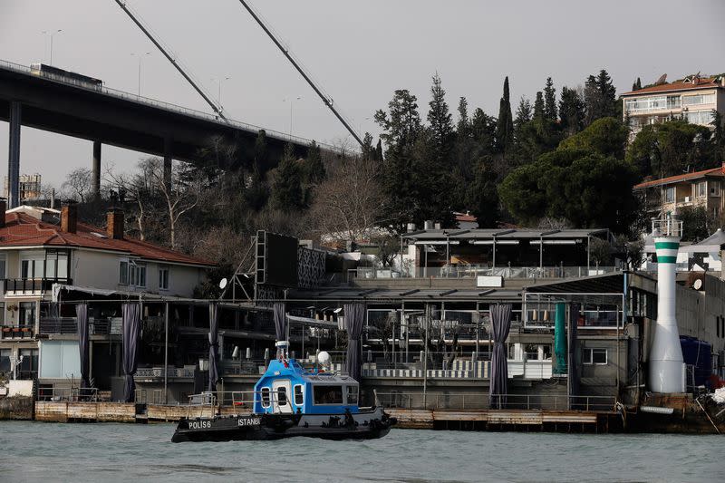 FILE PHOTO: Turkish coast guard boat patrols in front of the Reina nightclub by the Bosphorus, which was attacked by a gunman, in Istanbul,