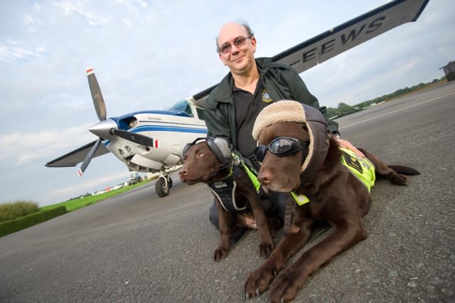 Pooch pilot employs puppy co-pilot