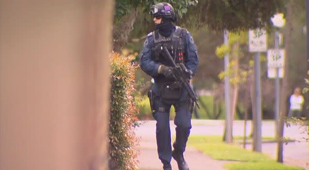 Two suspects arrested following a tense stand-off with police in the heart of Adelaide. Photo: 7News