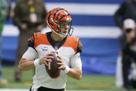 Cincinnati Bengals quarterback Joe Burrow (9) looks to throw during the first half of an NFL football game against the Indianapolis Colts, Sunday, Oct. 18, 2020, in Indianapolis. (AP Photo/Michael Conroy)