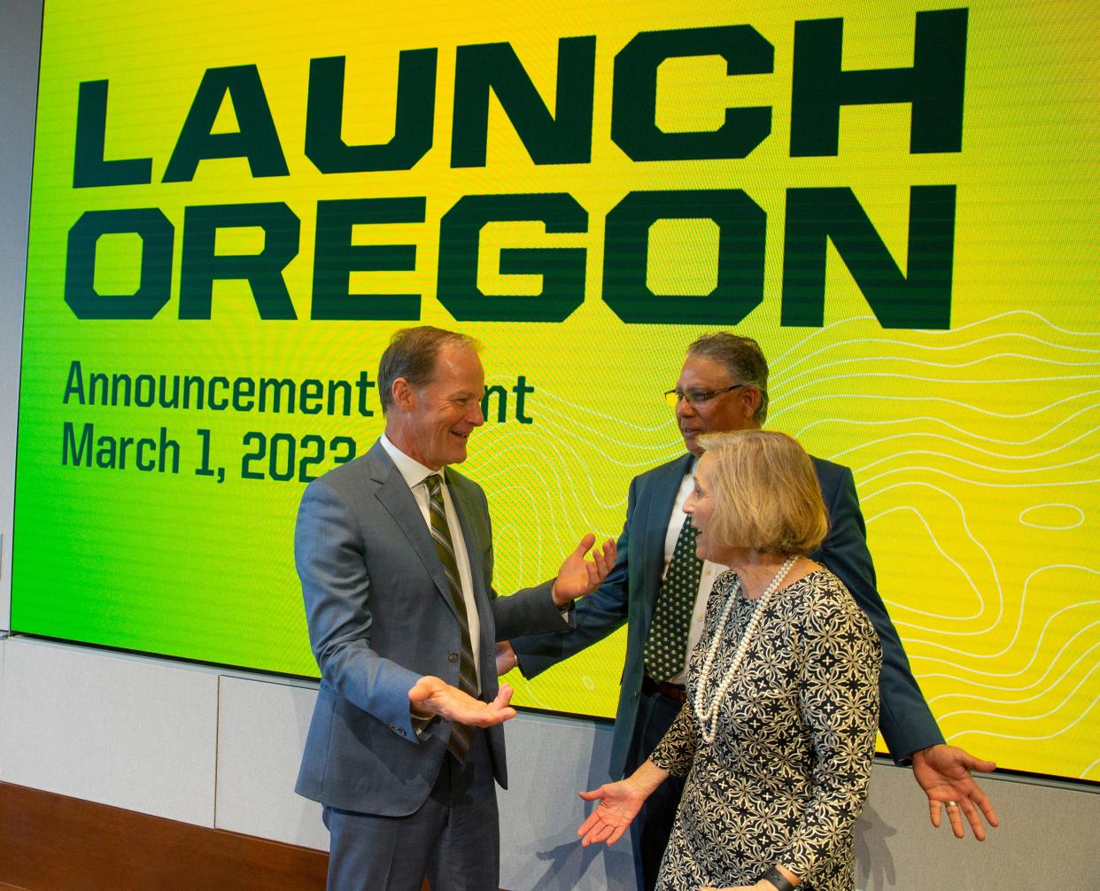 Paul Weinhold, president and CEO of the University of Oregon Foundation board, left, visits with Anshuman Razdan, University of Oregon vice president for research and innovation, and Susan Stevens, chair of the University of Oregon Foundation board, after the announcement of Launch Oregon.
