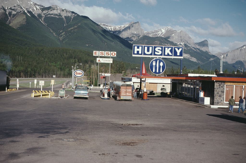 Husky rest stop in the mountains of Colorado, with Esso gas station, 1966