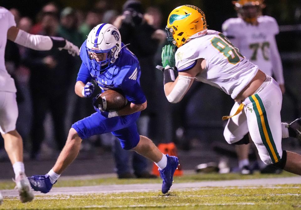 Bishop Chatard Trojans wide receiver Sam Feeney (10) rushes up the field Friday, Oct. 20, 2023, during the game at Bishop Chatard High School in Indianapolis. The Bishop Chatard Trojans lead at the half against the Tippecanoe Valley Vikings, 21-0.