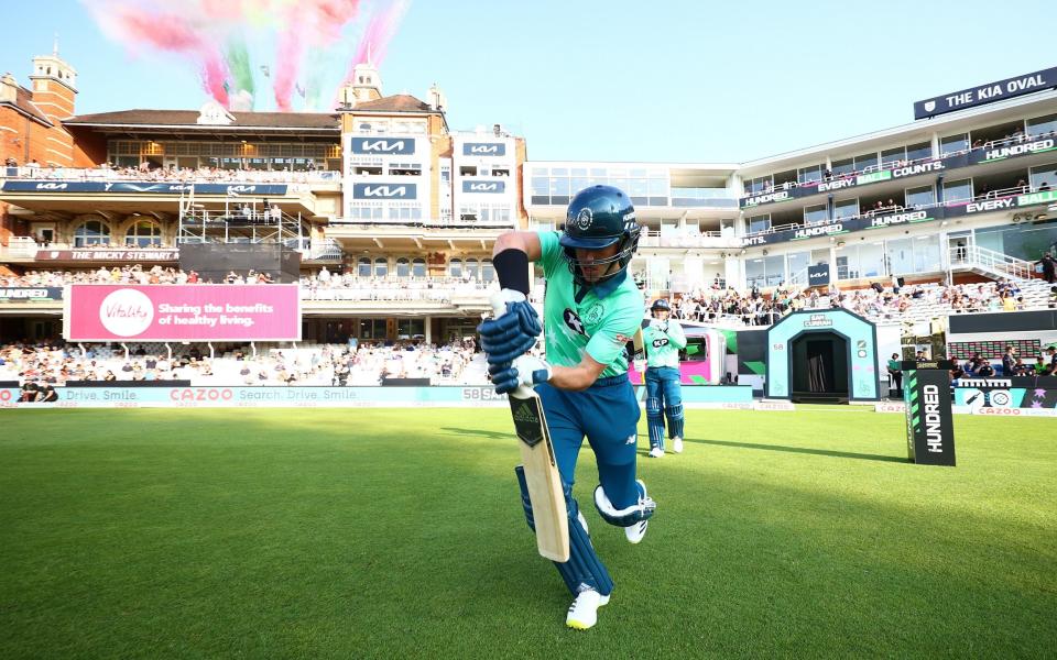 Sam Curran of the Oval Invincibles walks out to bat during The Hundred match between Oval Invincibles Men and Manchester Originals Men at The Kia Oval on July 22, 2021 in London, England - ECB/ECB via Getty Images