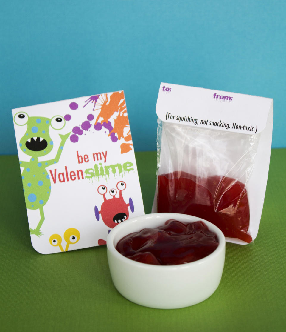 This Jan. 17, 2013 photo shows a Valentine's Day card attached to a package of handmade "slime," in Concord, N.H. Boys who find hearts and flowers icky will be happy to give their friends this fun alternative to cards and candy. (AP Photo/Holly Ramer)