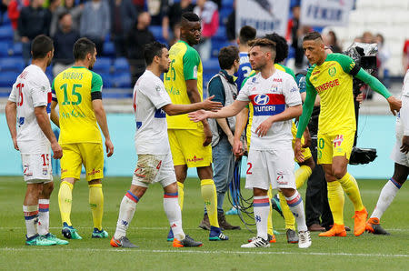 Soccer Football - Ligue 1 - Olympique Lyonnais v FC Nantes - Groupama Stadium, Lyon, France - April 28, 2018 Lyon's Rafael and Jordan Ferri shake hands after the match REUTERS/Emmanuel Foudrot