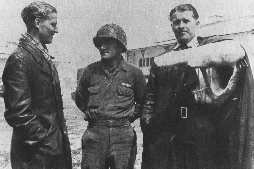 Magnus von Braun, left, Pfc. Frederick P. Schneikert, middle, and Wernher von Braun, right, pose, Tuesday, May 8, 1945, following the two von Braun scientists surrender to the U.S. Army at the end of World War II. Magnus von Braun approached Schneikert on a bicycle to surrender.