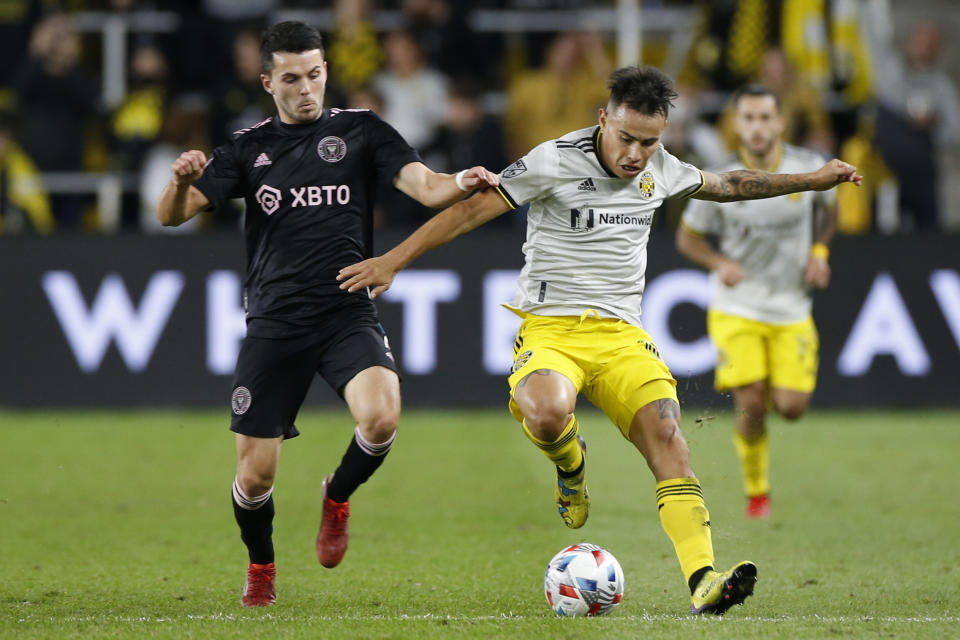 Inter Miami's Lewis Morgan, left, and Columbus Crew's Lucas Zelarayan chase the ball during the second half of an MLS soccer match Saturday, Oct. 16, 2021, in Columbus, Ohio. (AP Photo/Jay LaPrete)