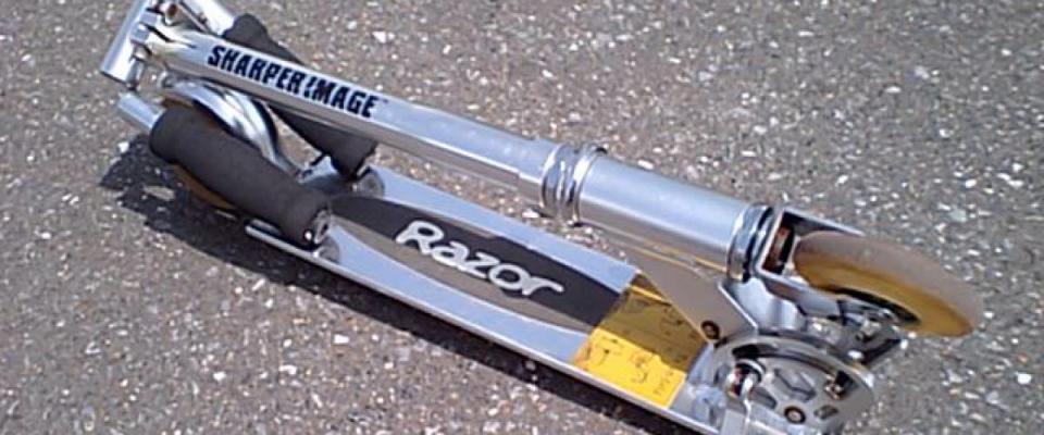 Razor Scooter folded up on the street