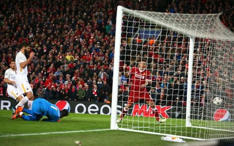 Firmino turns in Liverpool's fourth - Credit: Dave Thompson/AP