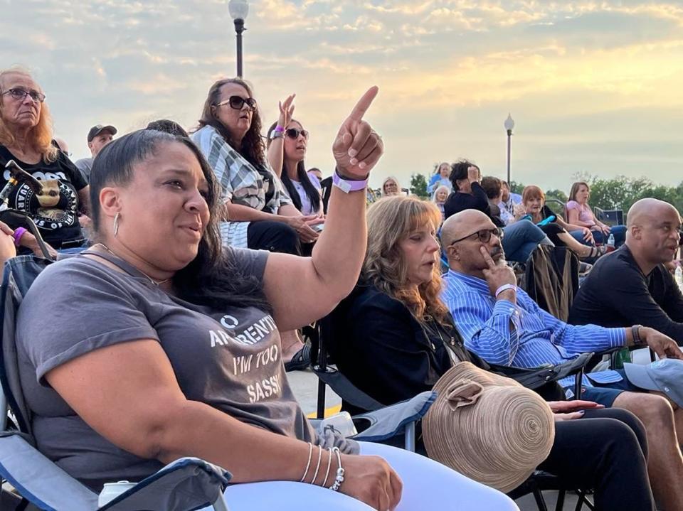 Fans enjoy the music of The Prince Project on Saturday, one of the tribute fans featured in the summer at Jackson Amphitheater.